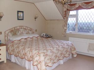 Bedroom One- click for photo gallery